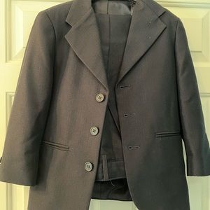Boy’s navy suit; size 8 reg.
